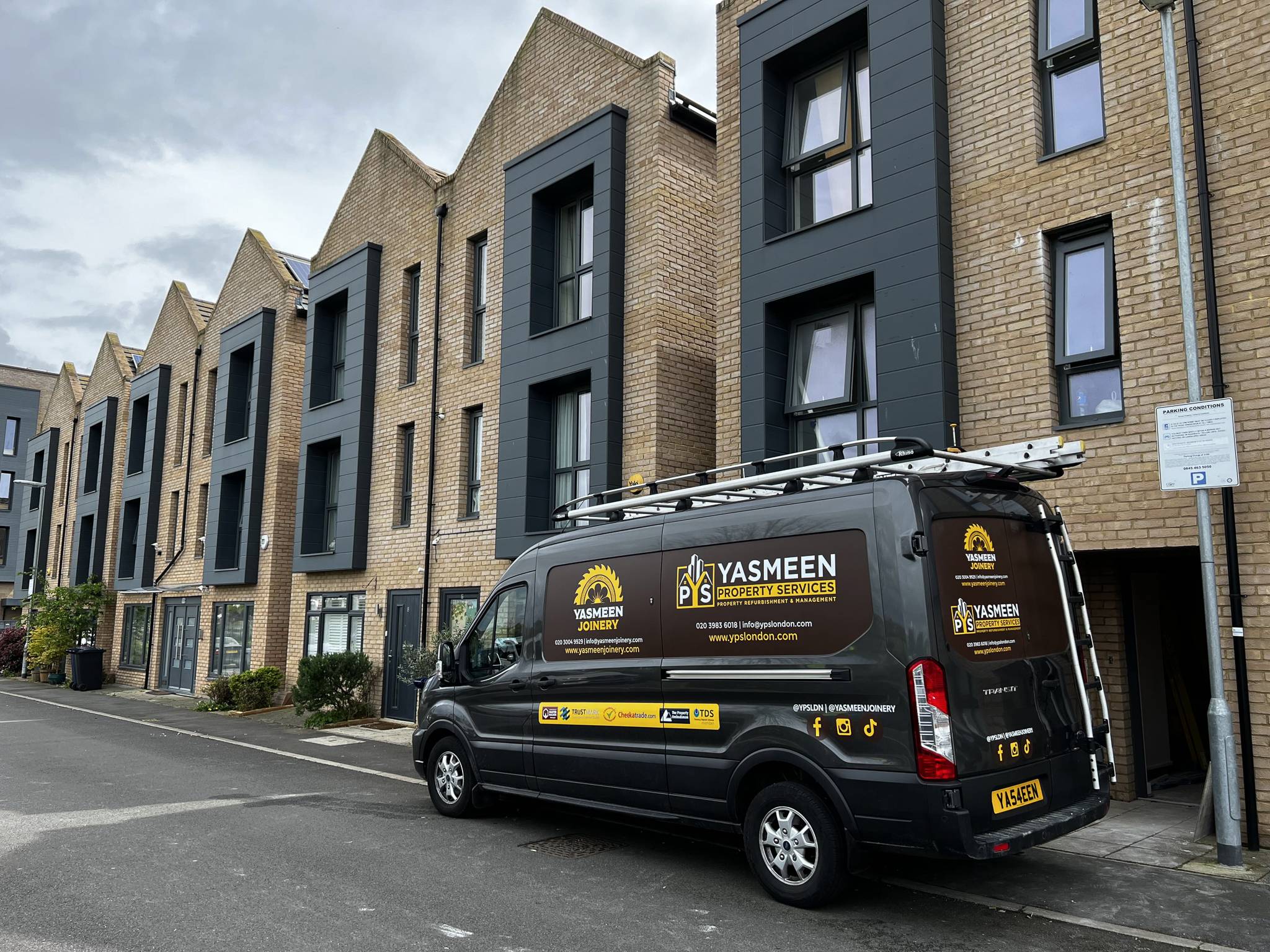 The Yasmeen Property Services and Yasmeen Joinery van parked on a residential street